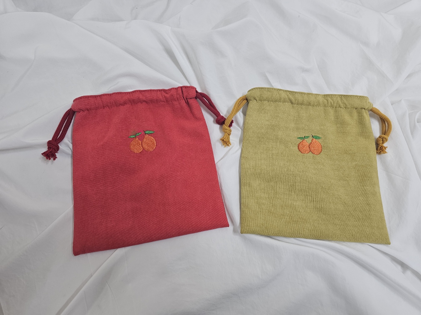 한라봉자수파우치  제주도소품 스트링파우치 여행선물추천 피그먼트고급원단사용