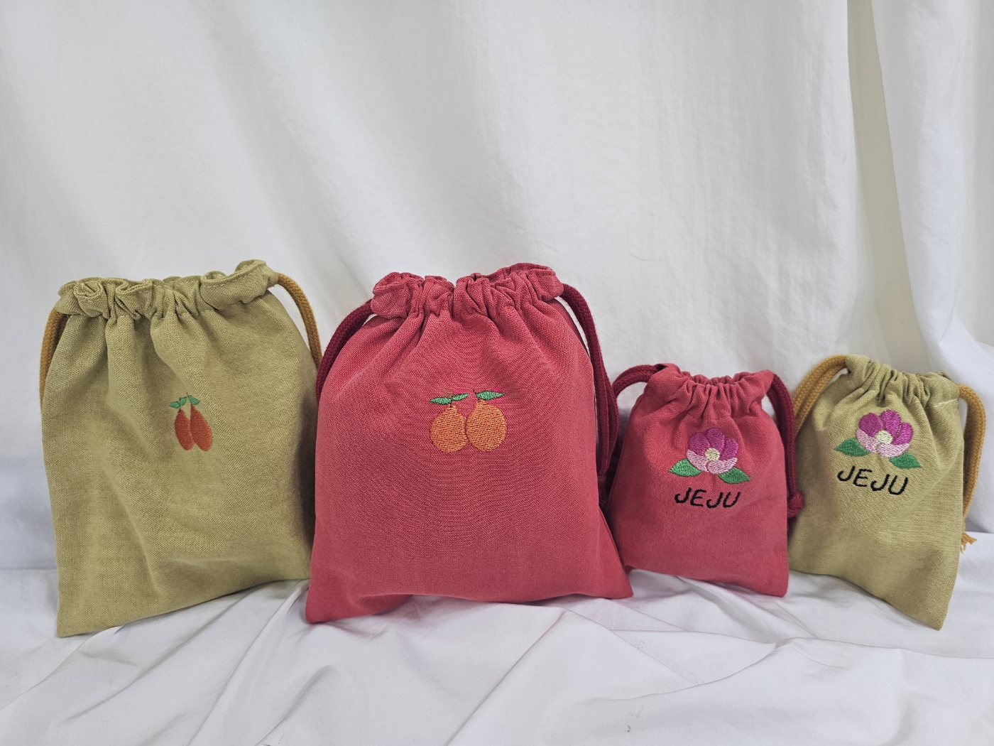 한라봉자수파우치  제주도소품 스트링파우치 여행선물추천 피그먼트고급원단사용